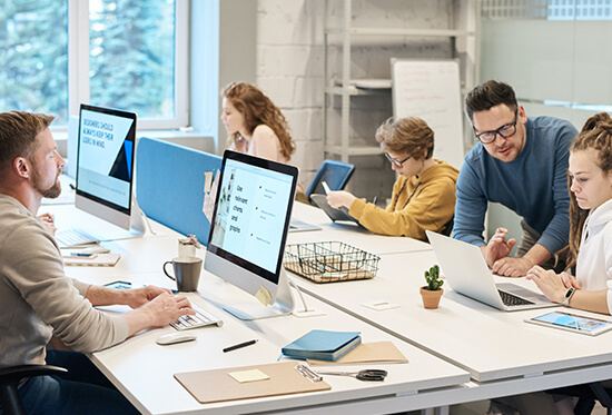 Group of employees working at a digital marketing agency